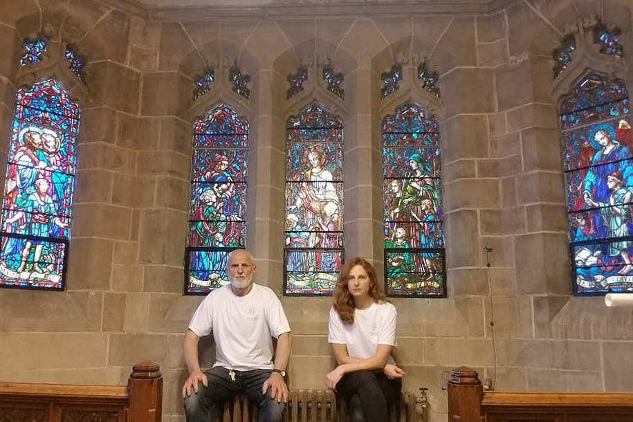 Baltic Art Studio team in McWilliams Chapel after historic stained glass restoration