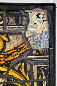 Deteriorated Franz Xaver Zettler stained glass panel before restoration at St. Hyacinth Basilica