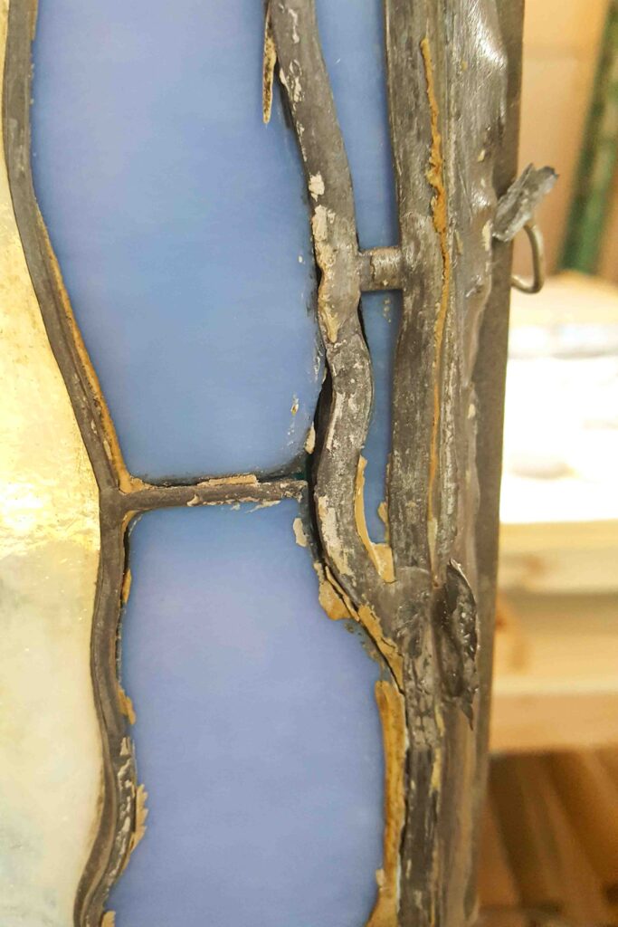 Tiffany glass piece during conservation cleaning