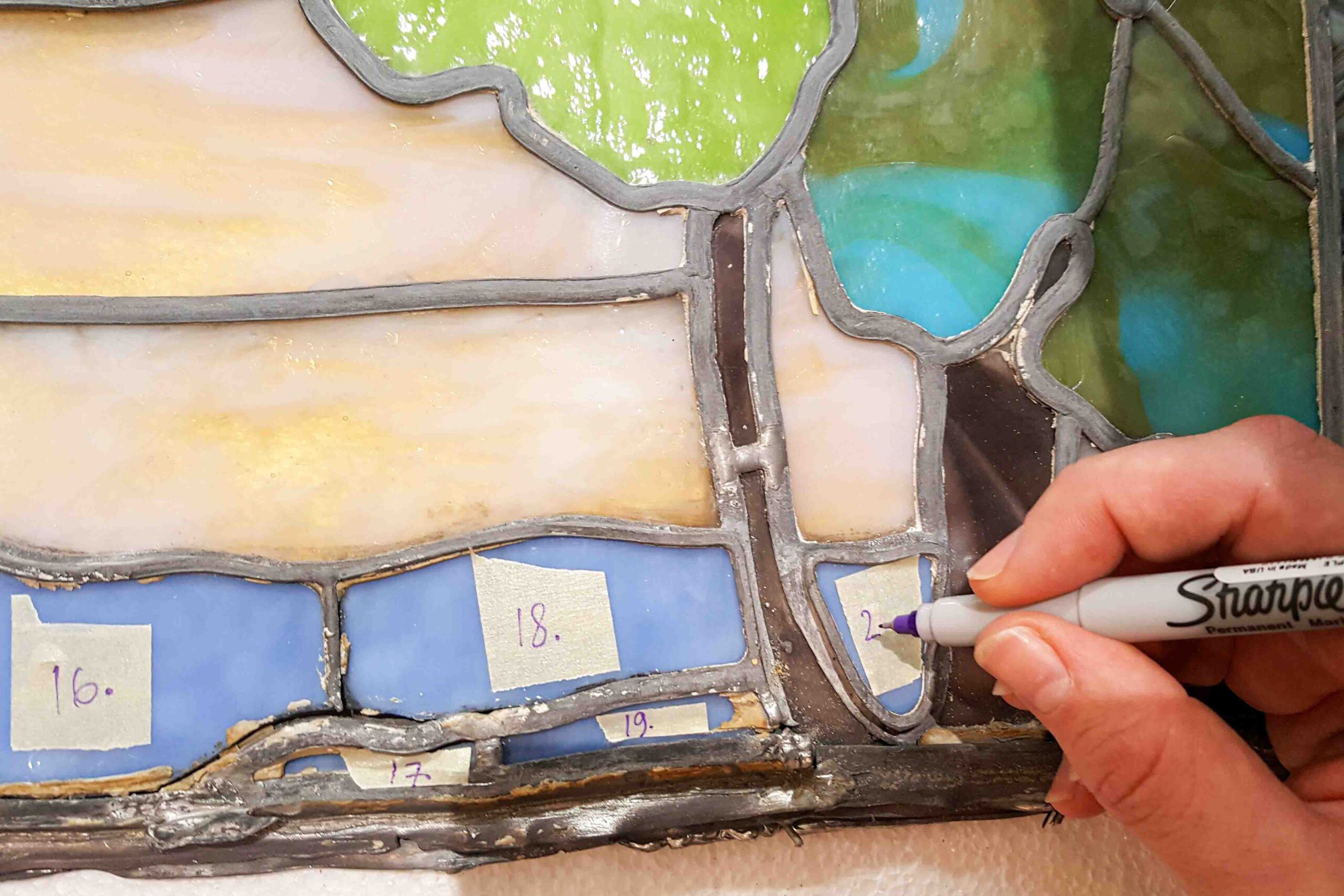 Documented Tiffany stained glass pieces prepared for restoration