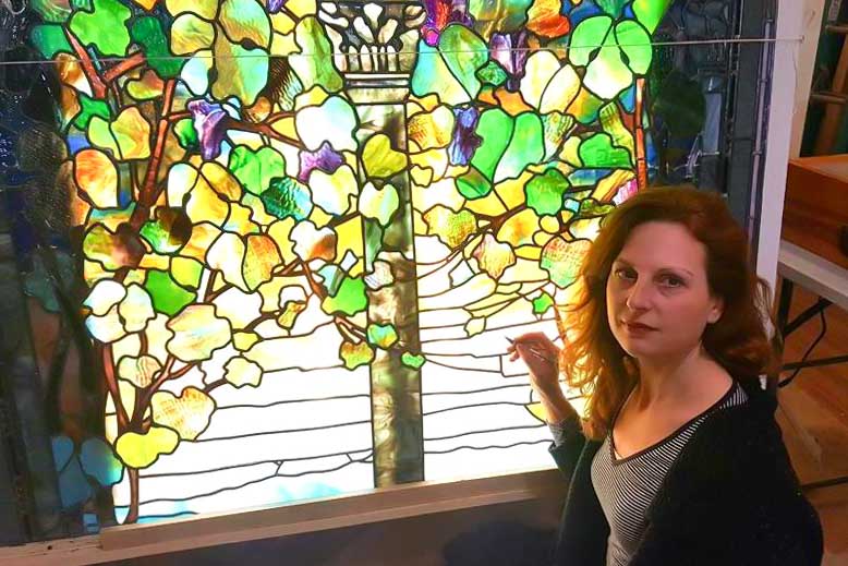 Tiffany Studios stained glass window during releading and structural restoration