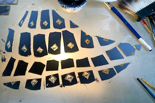 Hand-painted stained glass pieces prepared for Three Archangels window fabrication